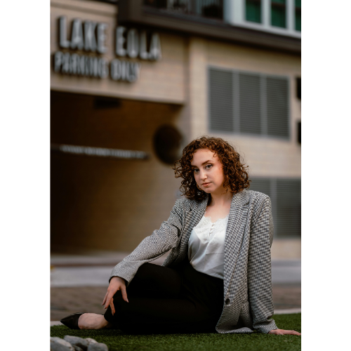 Young woman posing near Lake Eola in Orlando